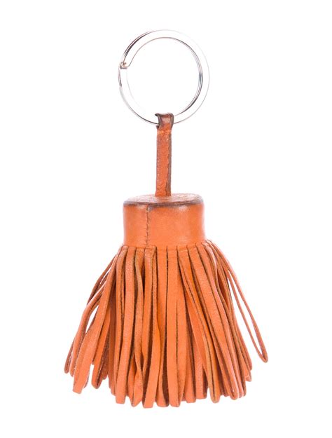 hermes leather tassel keychain|real real Hermes keychain.